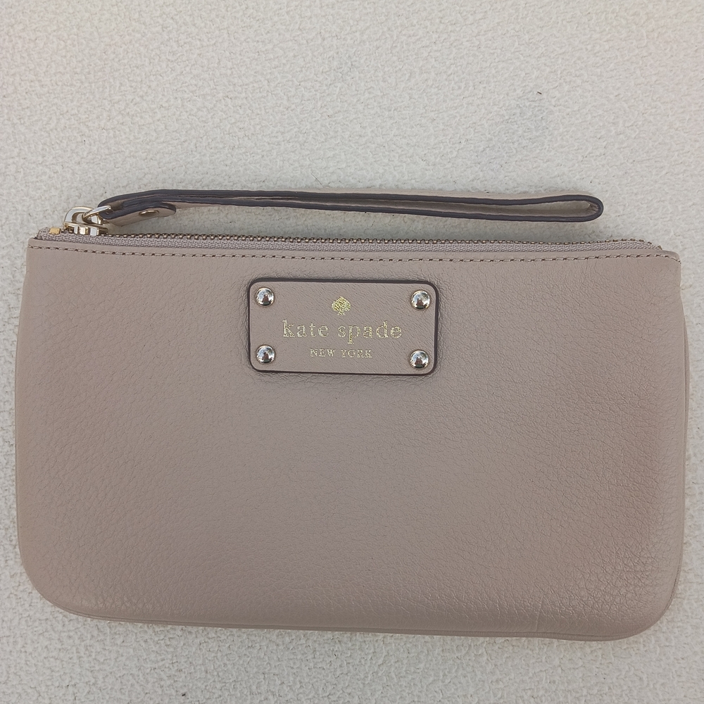 kate spade taupe leather wristlet with gold plaque
